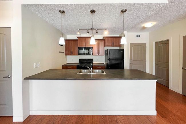 1209 - 204 Sparrow Hawk Drive, Home with 2 bedrooms, 2 bathrooms and 2 parking in Fort Mcmurray AB | Image 4