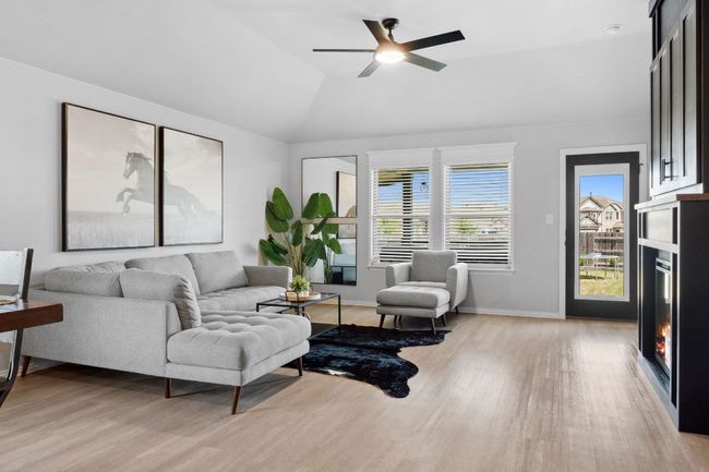 The living room guides you to the incredible back patio. | Image 15