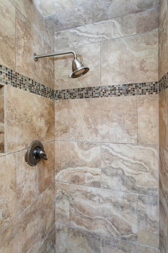 Bathroom view of tiled shower | Image 16