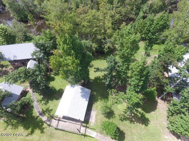 10012 Sw Windsong Way, Home with 3 bedrooms, 3 bathrooms and null parking in Blountstown FL | Image 78