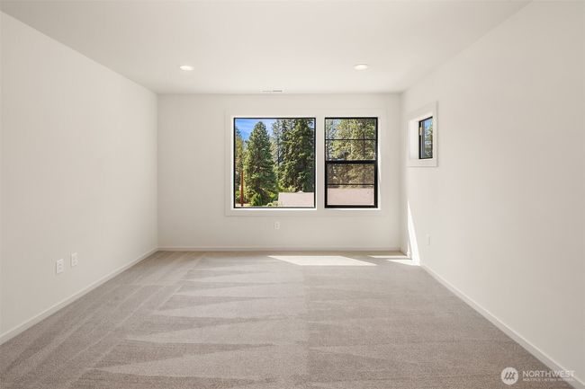 As the newest PNW master-planned community, enjoy 200+ acres of open space, trails & the Coal Trax Mt Bike Park. Soaring ceilings in the great roommake each day worthy of celebration & open floorplan appeals to entertaining. Covered deck & patio. Southern-facing homesites range from the mid600s- 900ks. Enjoy a variety of innovative & distinctive new home options with the best all-season recreation just moments away! Built for the future, indulge in a retreat just 90-min to Seattle. Plans and elevations are artist’s renderings only, may not accurately represent the actual condition of a home asconstructed and may also contain options and upgrades which are not included in the sale. Trailside Homes reserves the right to make changes to the floorplan, specifications, dimensions, design and elevations without prior notice. Stated dimensions and square footage are estimated and should not be usedas representations of the home’s actual size. | Image 35