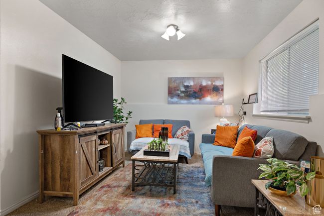 Living area featuring carpet and baseboards | Image 45