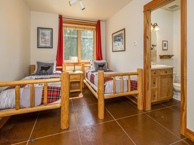 Lower level bedroom #2 with ensuite bath | Image 43