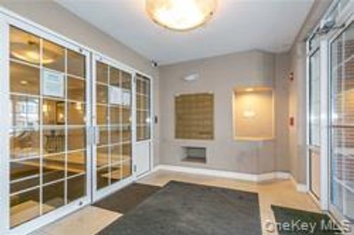 one Portico Ct, Great Neck, NY, 11021-2028 | Card Image