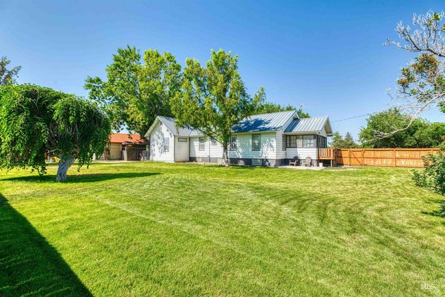 Back of property with a metal roof | Image 33