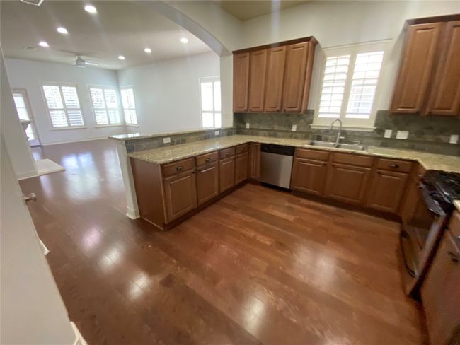 Corner unit with extra windows bring in great natural lighting throughout the space. | Image 4