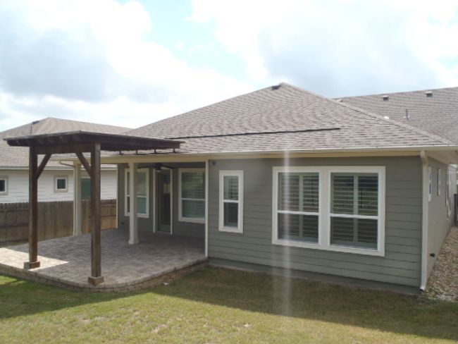 Back of property with a patio and roof with shingles | Image 10