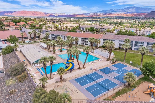 Bird's eye view of a mountain backdrop and a pool | Image 13