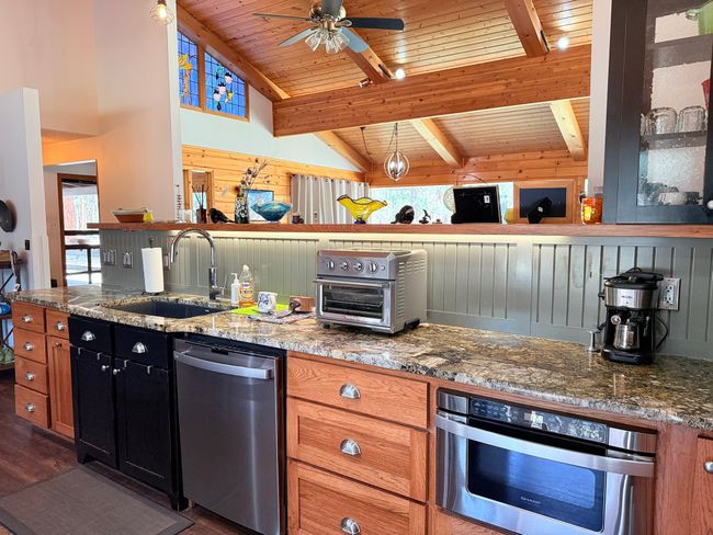 Kitchen featuring , built in microwave | Image 16