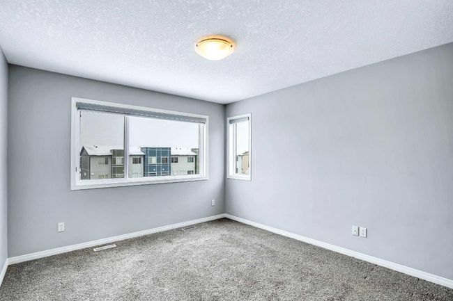 201 - 70 Saddlestone Dr Ne, Townhouse with 2 bedrooms, 3 bathrooms and 1 parking in Calgary AB | Image 13