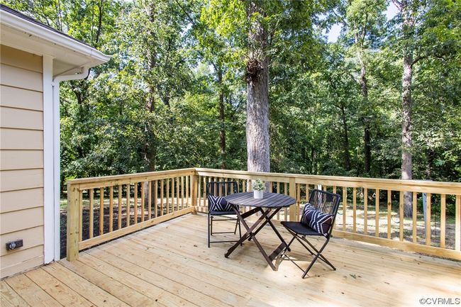 Renovated deck overlooking the big private backyard | Image 25