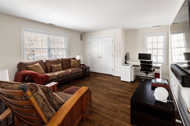 Bedroom/den with hardwood floors and large closet | Image 24