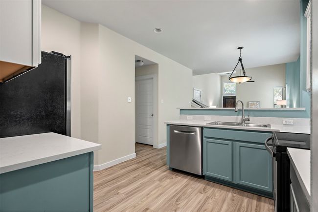 The open layout allows for easy movement, whether you’re whipping up a quick dinner, baking something special, or setting up a charcuterie board for guests | Image 14