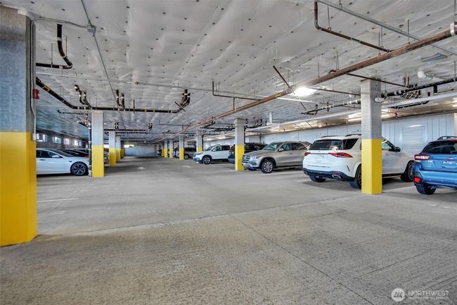 Two designated parking spaces in the common garage. | Image 23