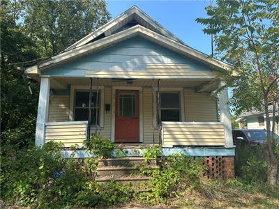 Bungalow-style home with a porch | Image 1