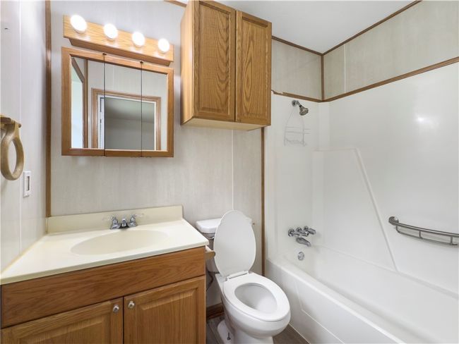 Bathroom with vanity and shower / bathtub combination | Image 13