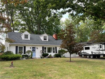 Cape cod house with a front lawn | Image 2