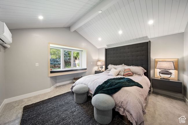 Bedroom with light carpet, baseboards, recessed lighting, and a wall mounted AC | Image 13