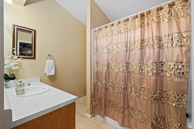 Bathroom with tile patterned flooring and vanity | Image 19