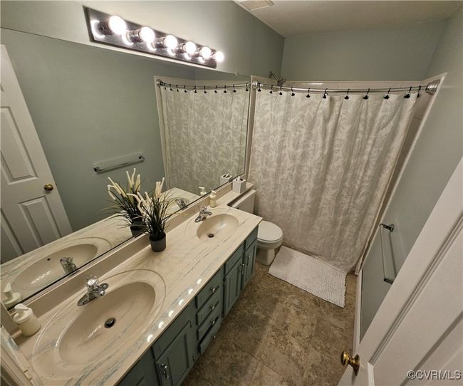 Laundry area with LVP Flooring, shelving and cabinetry to the other side | Image 28