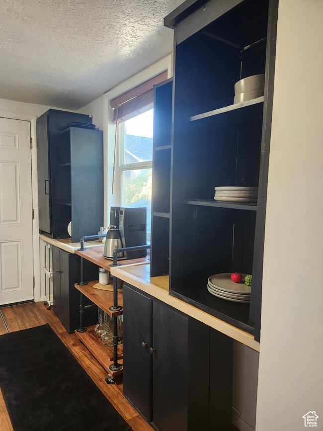 Black Cabinetry with open shelves | Image 16