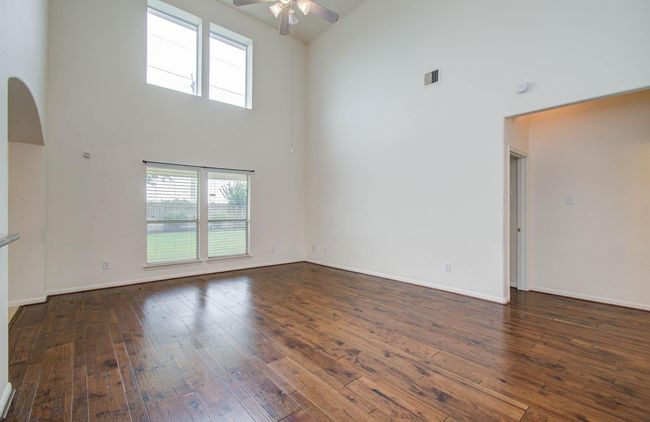 Beyond the family room is the primary bedroom. | Image 18