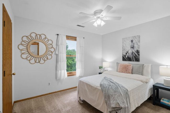 Large 2nd bedroom with walk in closet and a great view to rest, recharge. | Image 25