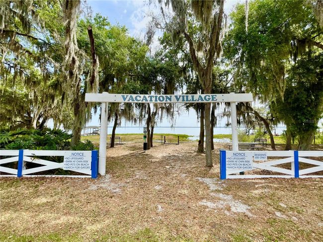 Vacation Village community private lakefront beach lot for your use | Image 53