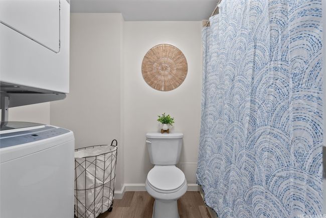 Convenient in-unit washer and dryer located right in the bathroom—perfect for maximizing functionality and ease in everyday living. | Image 16
