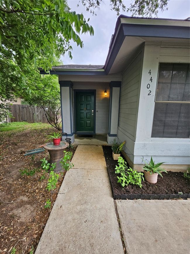Doorway to property featuring fence | Image 4