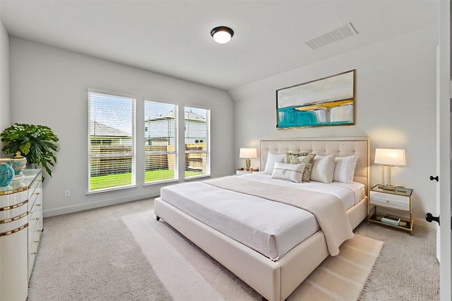 Carpeted bedroom featuring baseboards | Image 12