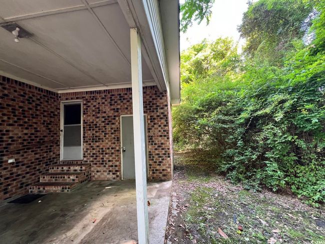 View of patio with entry steps | Image 4