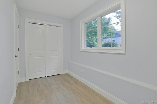Third bedroom on the lower floor. | Image 24