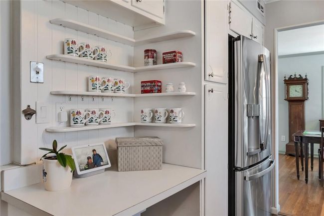 Bulit in shelving in the kitchen. | Image 6
