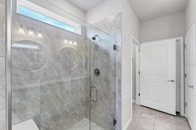 Primary walk in shower with frameless glass surround | Image 21