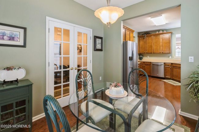 French doors open to the foyer. | Image 13