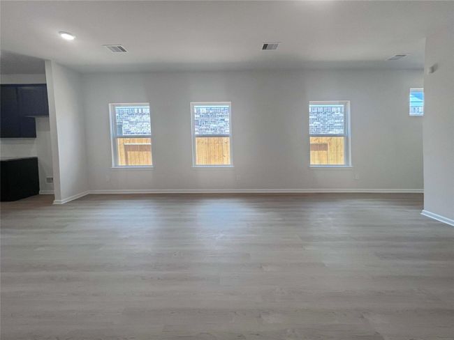 Family Room. Home under construction. Sample floor plan photo used for illustrative purposes only. Upgrades, selections options, windows and colors may vary. | Image 4
