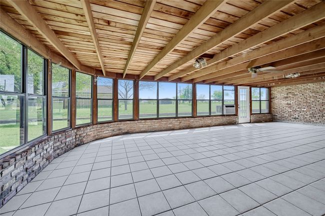 Unfurnished sunroom featuring cooling unit | Image 31
