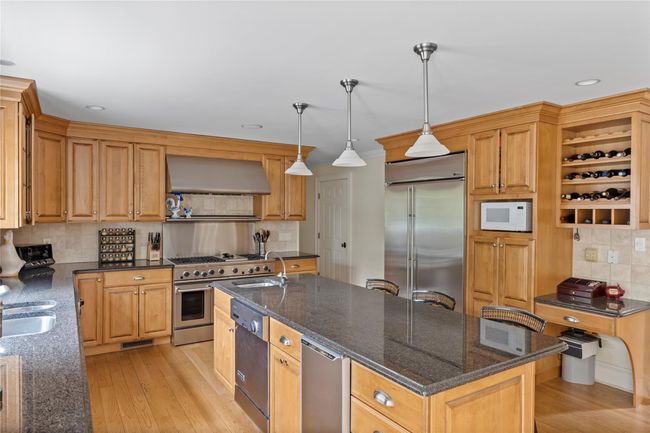 Chefs Kitchen with Large Granite Island, Oversized Fridge | Image 5