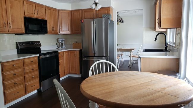 updated kitchen includes all appliances and new counter top | Image 14