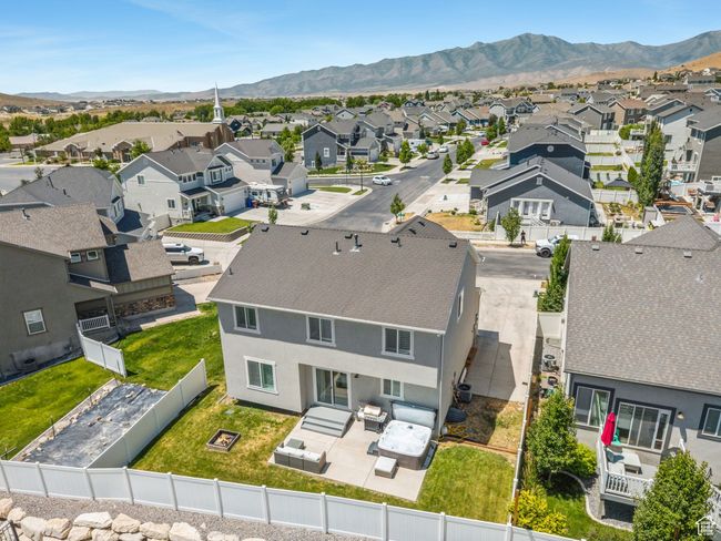 Aerial view of residential area with mountains | Image 33