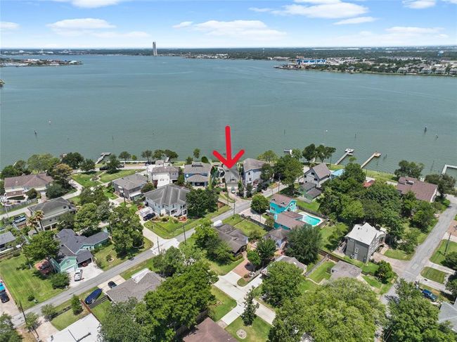 Experience breathtaking lake views from this elevated home, perfectly situated on the island's edge. | Image 4
