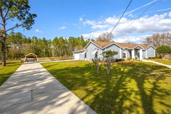 26733 Green Willow Run, House other with 3 bedrooms, 2 bathrooms and null parking in ZEPHYRHILLS FL | Image 5