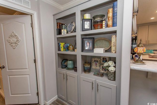 Storage area featuring visible vents | Image 15