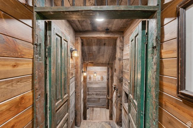 Interior space featuring wooden walls and wood ceiling | Image 46
