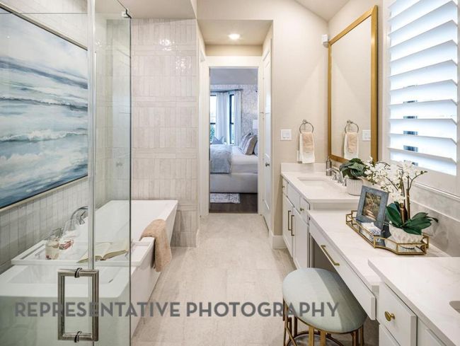 Full bath featuring vanity, a bath, a shower stall, and connected bathroom | Image 20