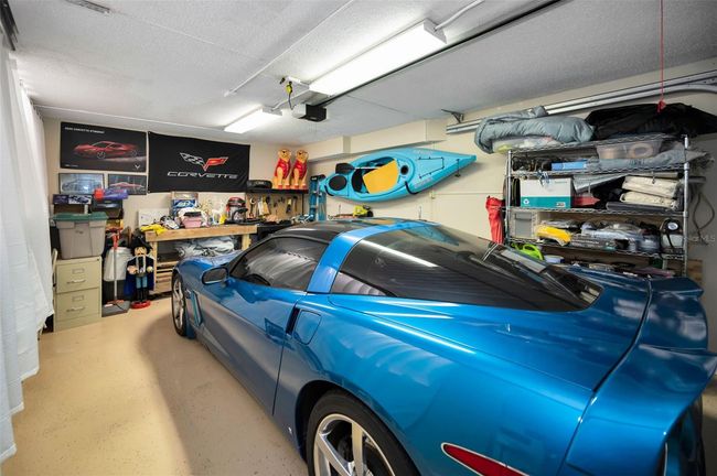 OVERSIZED 1 CAR GARAGE WITH EXTRA STORAGE SHELVING BEHIND THE CURTAIN | Image 71