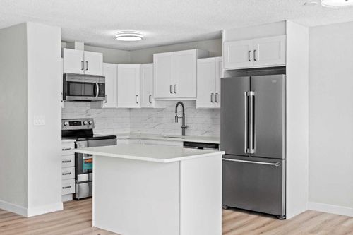 937 Marcombe Dr Ne, Calgary, AB, T2A3H2 | Card Image