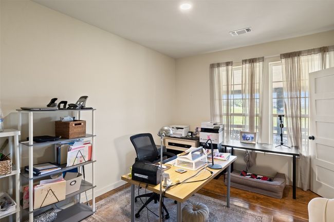 Guest Bedroom on main level being used as a study. | Image 14