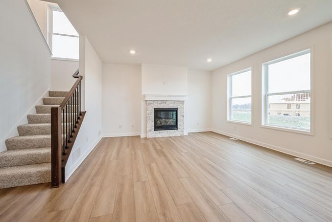 Photo is of the actual home. Another view of the great room. | Image 5